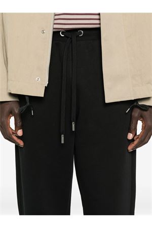 Pantaloni sportivi in cotone nero AMI | UTR805747001