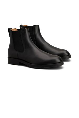 Stivaletti in pelle di vitello nero TOD'S | XXM75L00P20D90B999