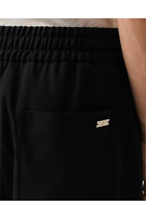Pantaloni in gabardine di lana nera AMI | HTR868WV0194001