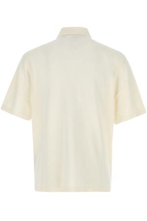 Polo in piquet di puro cotone bianco crema AMI | UPL428JE0221136