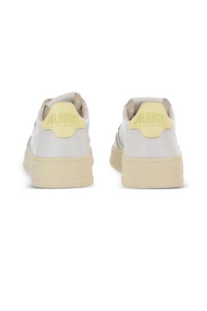 Sneakers Medalist Low In Pelle Bianca E Gialla AUTRY | AULWDL02.