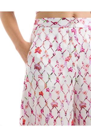 Pantaloni a zampa d'elefante in raso di seta GENNY | 80AJA1P3NS868495