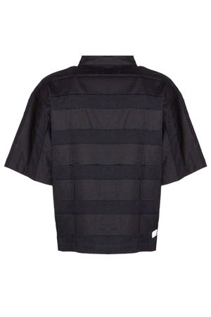 Polo in cotone nero NINEINTHEMORNING | SIM01SAIMONNERO